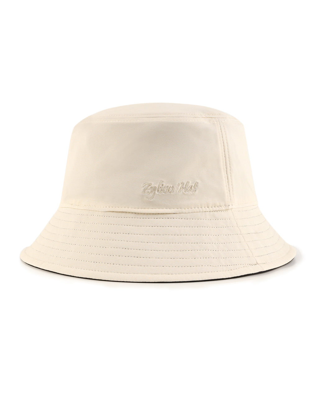 Beige reversible bucket hat reverse side showing alternate pattern