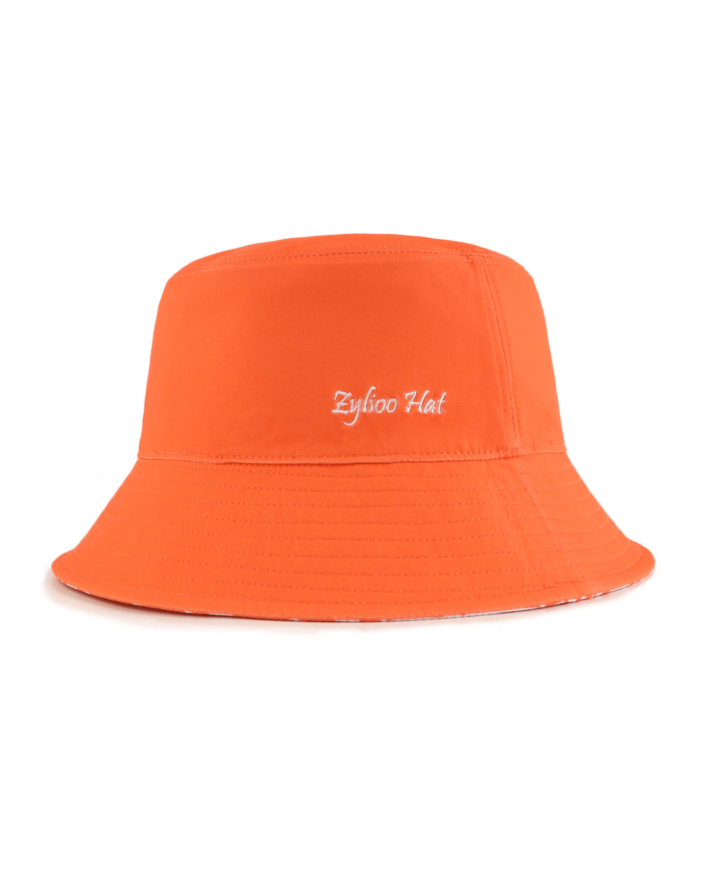 Orange reversible bucket hat reverse side showing alternate pattern