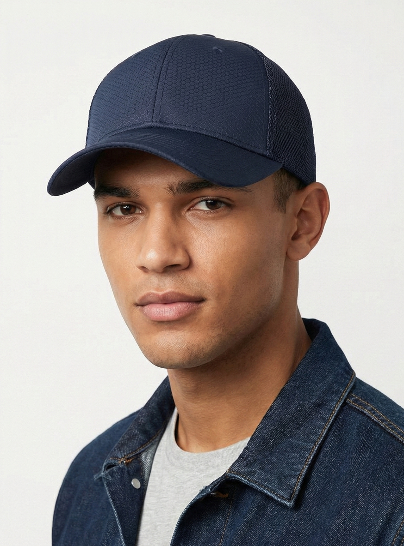 Navy blue breathable mesh trucker hat for big heads XXL - on model lifestyle photo