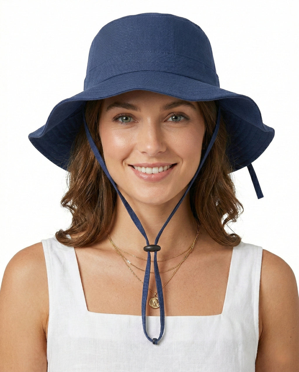 Model wearing floppy wide brim sun hat with neck drape for big heads