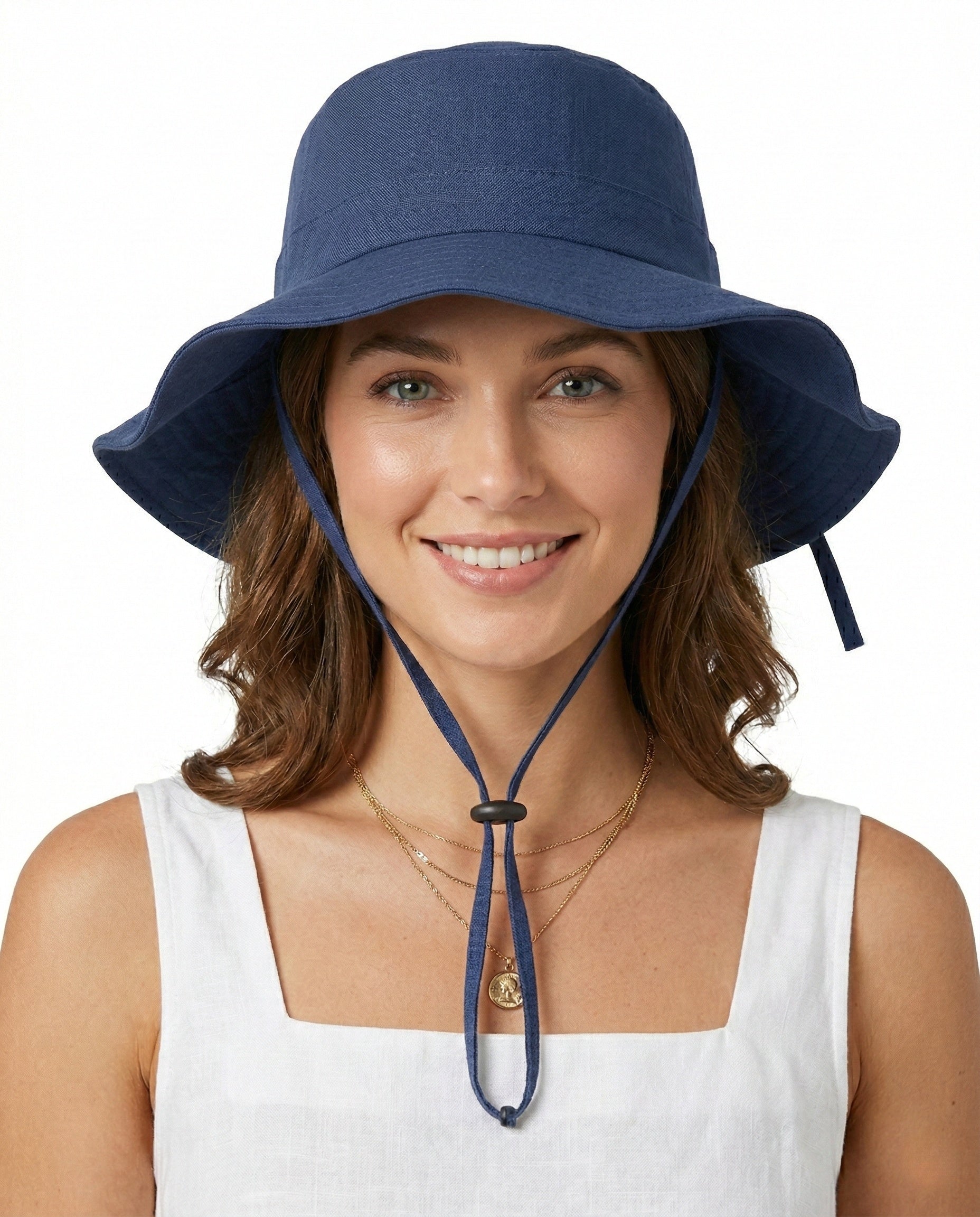 Model wearing floppy wide brim sun hat with neck drape for big heads
