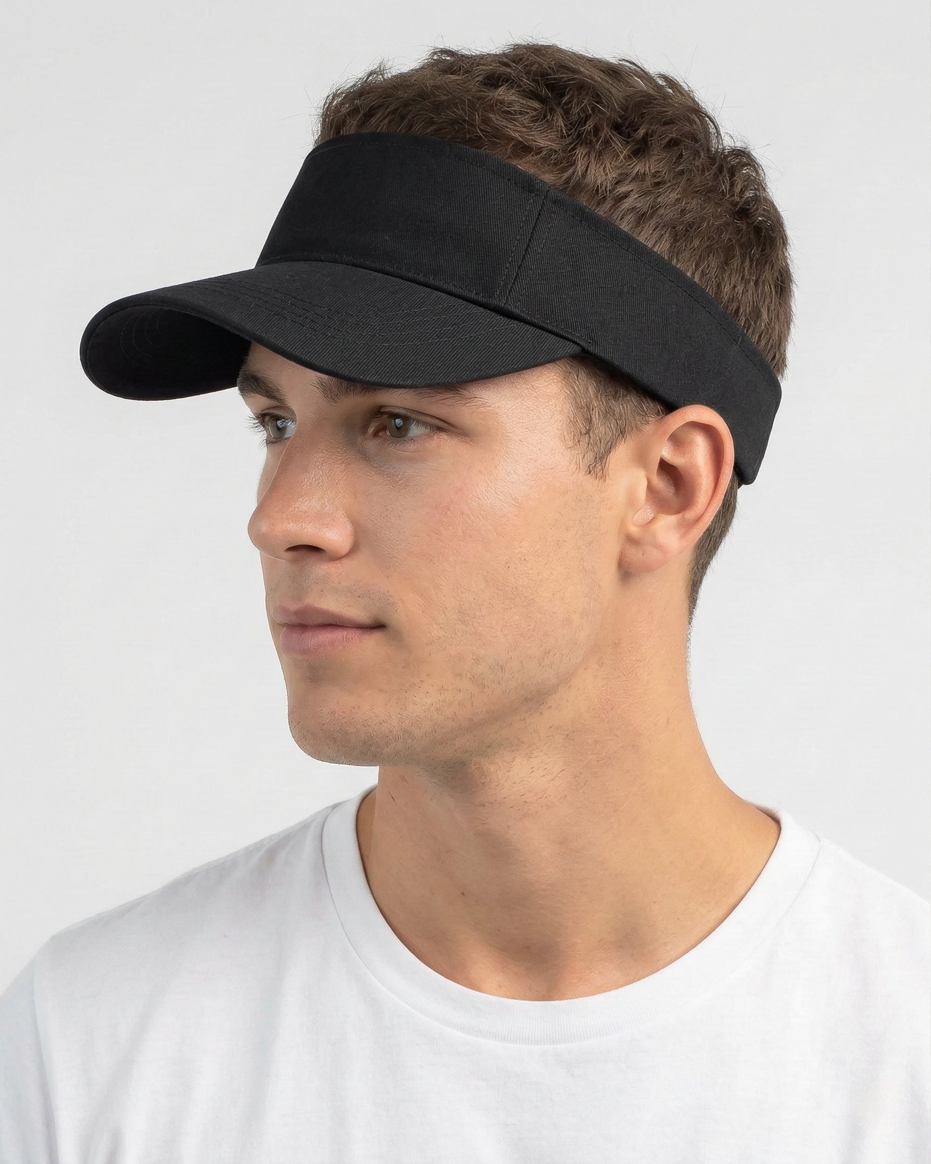 Model wearing wide brim sun visor for big heads