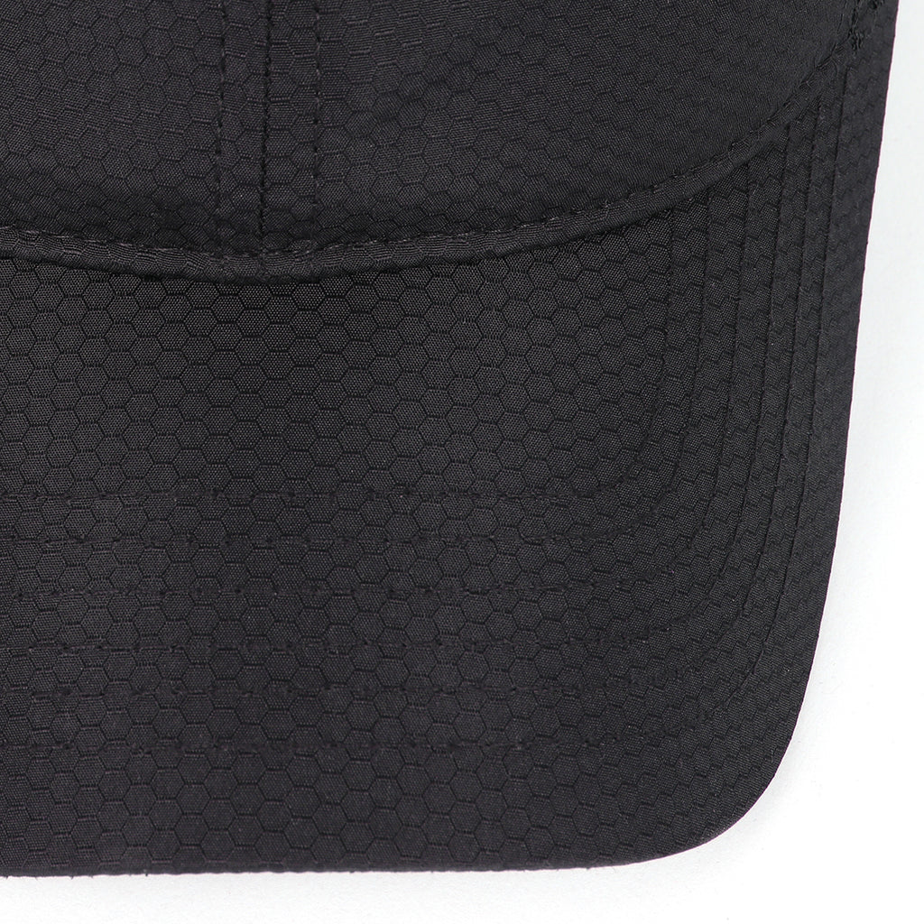Black breathable mesh trucker hat for big heads - curved brim close-up