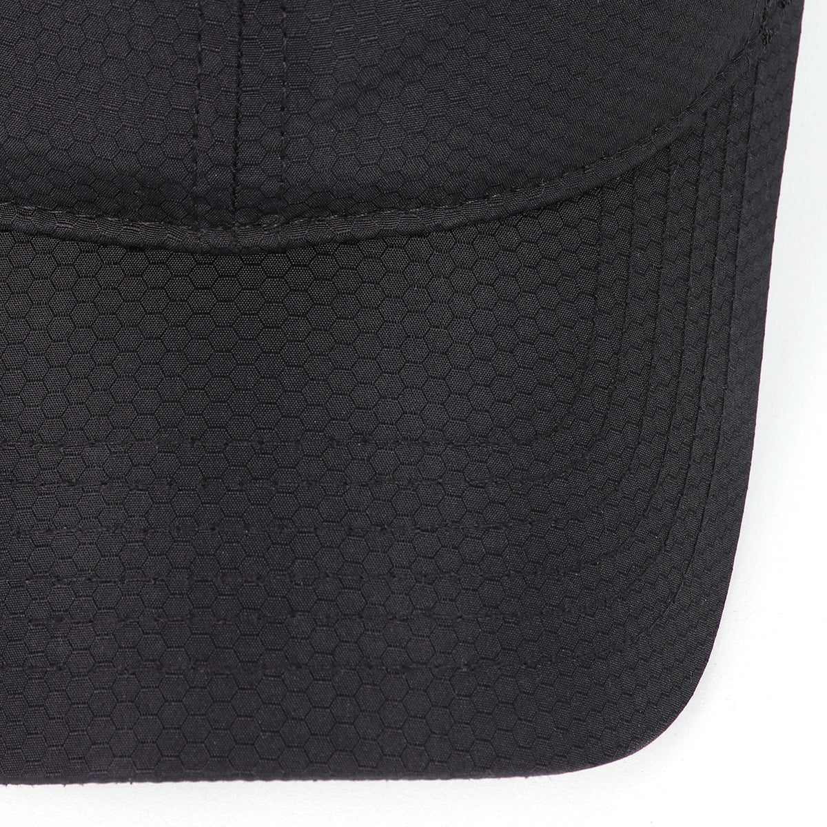 Black breathable mesh trucker hat for big heads - curved brim close-up